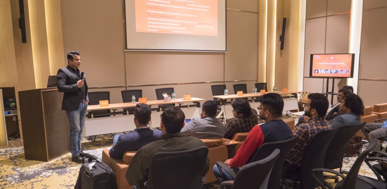 Manipal Dhariwal speaking to seated attendees at Magento Meetup Chandigarh
