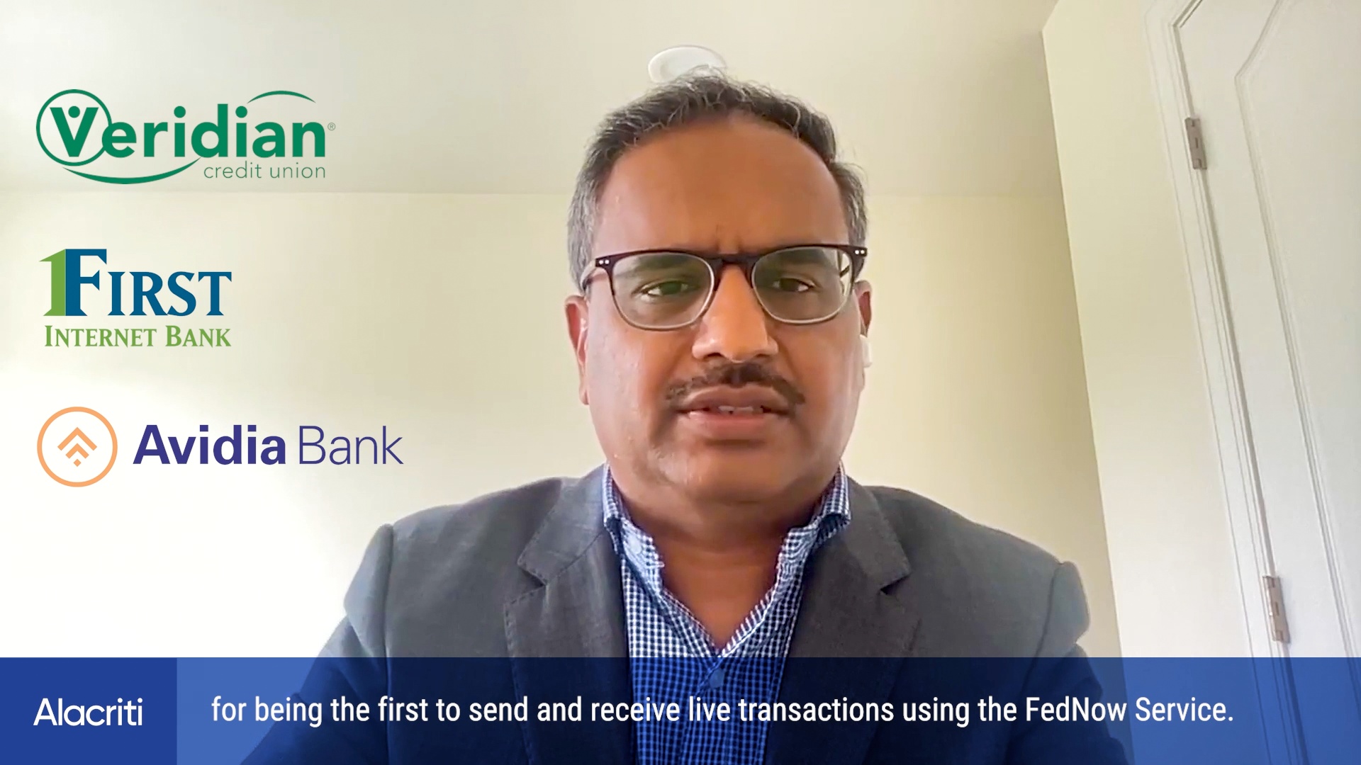 Manish Gurukula speaking in Alacriti’s July 2023 FedNow launch video, with customer logos beside him.