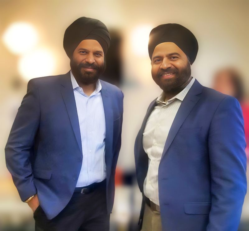 Manmeet Virdi and his brother Kamalpreet Virdi in blue jackets