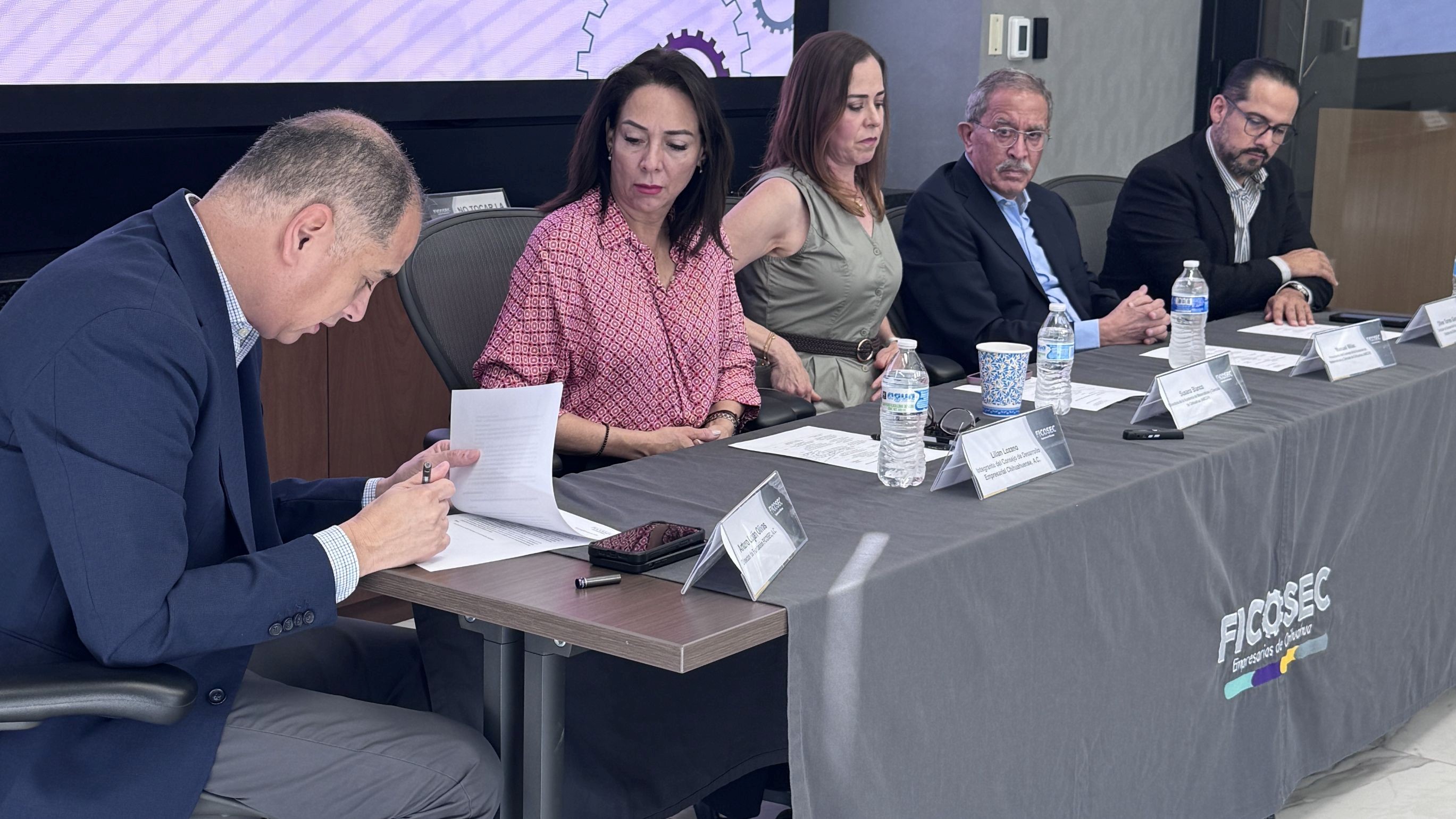 Five representatives at the September 2026 STEM program announcement, with Manuel Milán seated second from right.