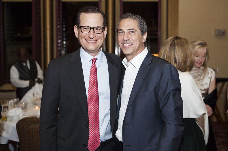 Rodger Krouse, left, and Marc Leder, right, together at a dinner