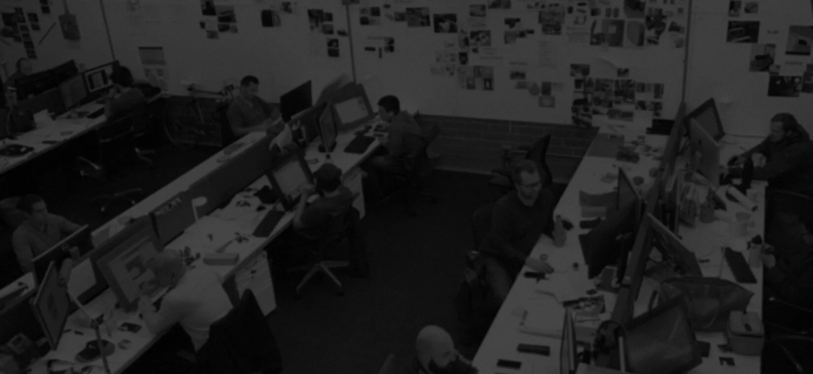 Designers at work among screens and research boards in the Lifestyledesign studio