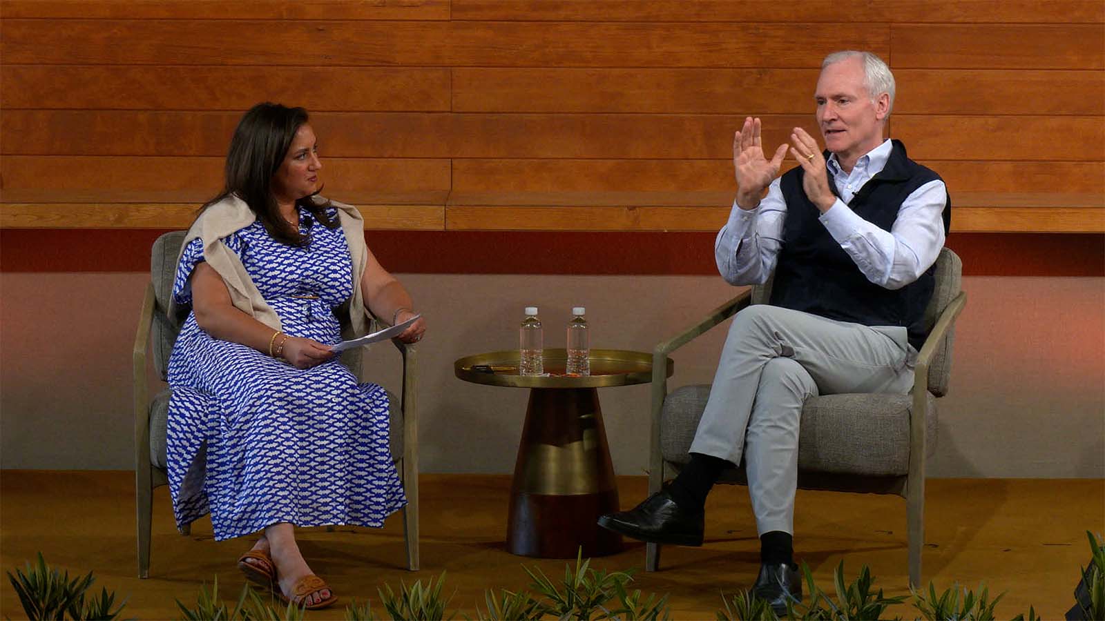 Marc Tessier-Lavigne speaking with Sonia Gupta at a Goldman Sachs event