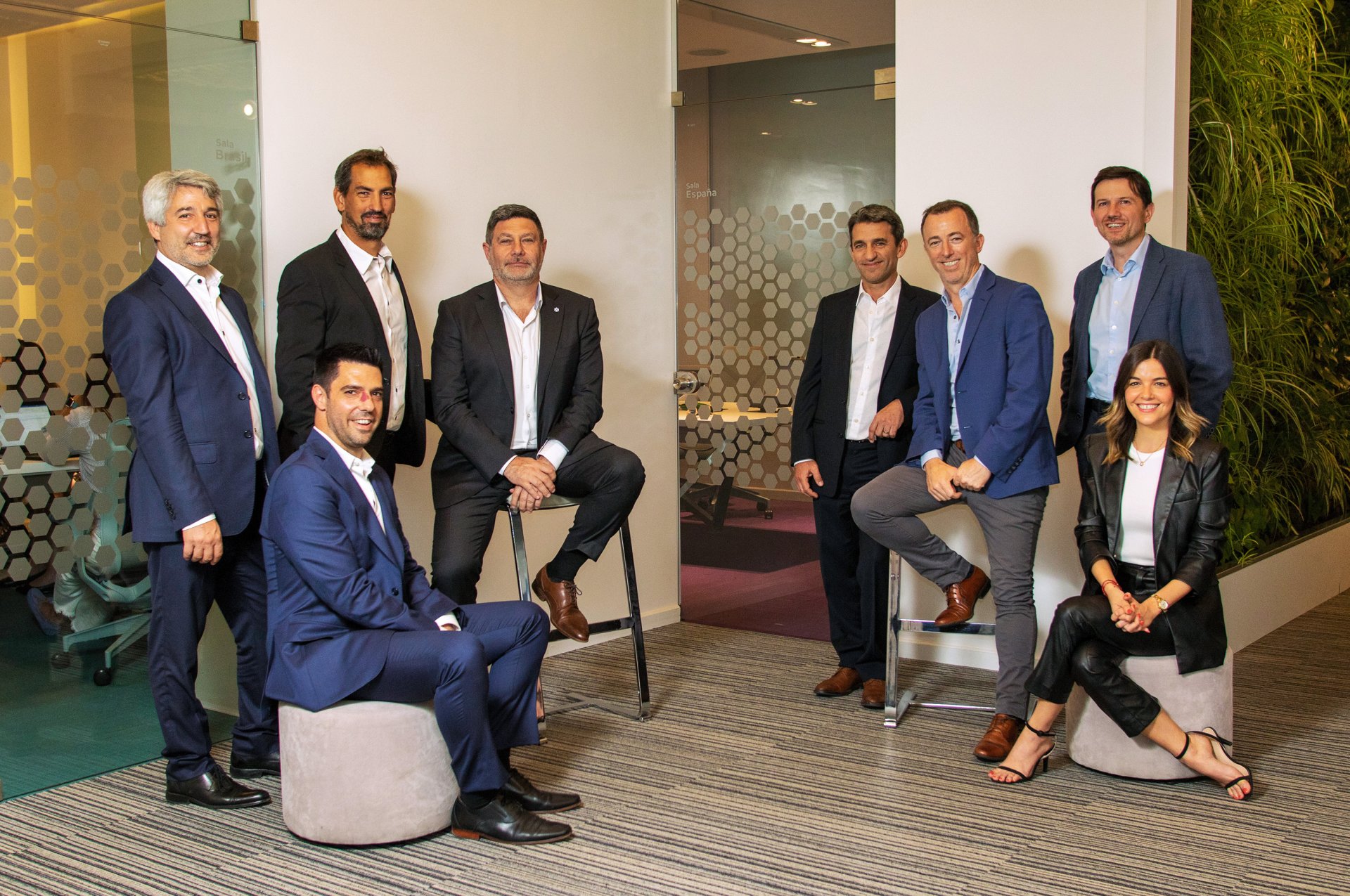 Marcelo González, at far left, with seven colleagues in Veritran’s Buenos Aires office