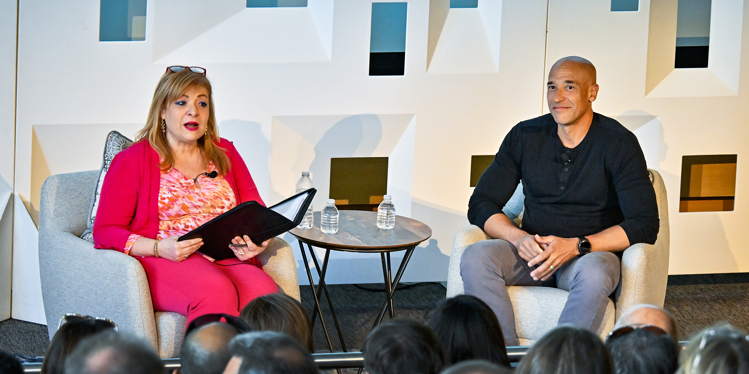 Georgia Perakis, left, speaks with Marcus Wilson at MIT Sloan Reunion 2024