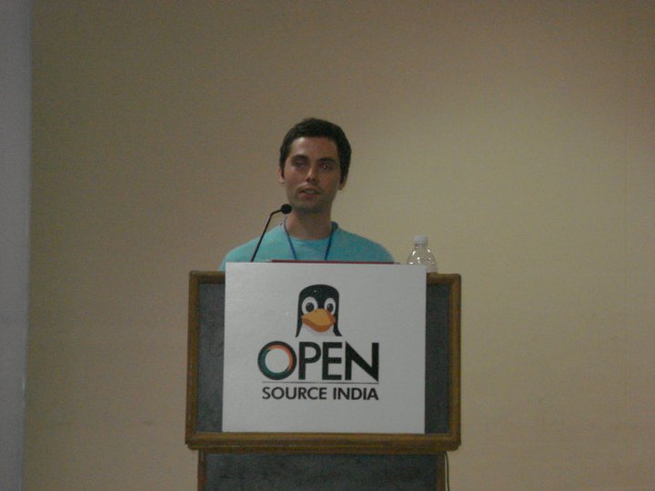 Marek Sotak speaking at the Open Source India lectern