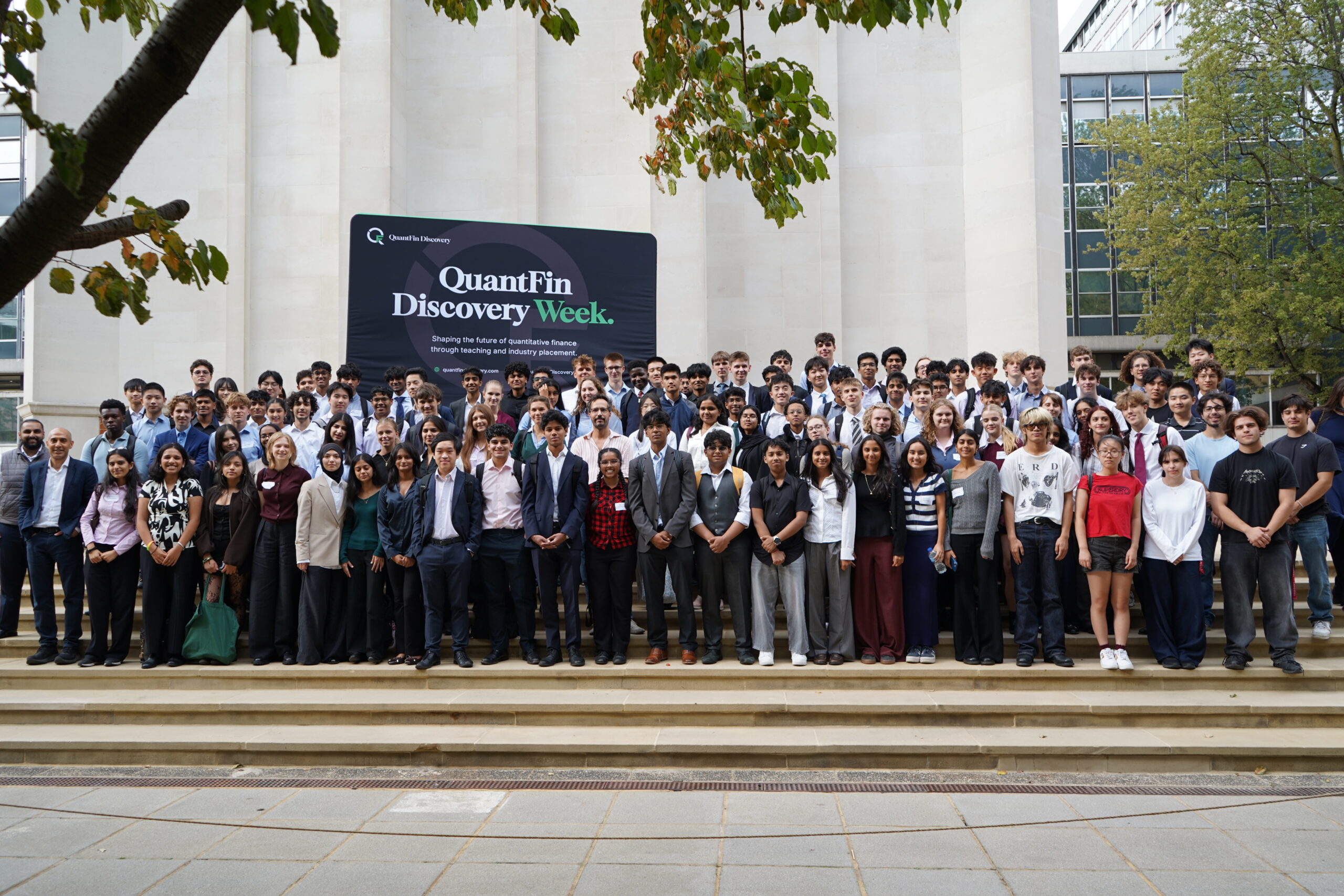 QuantFin Discovery Week participants gathered outside a university building