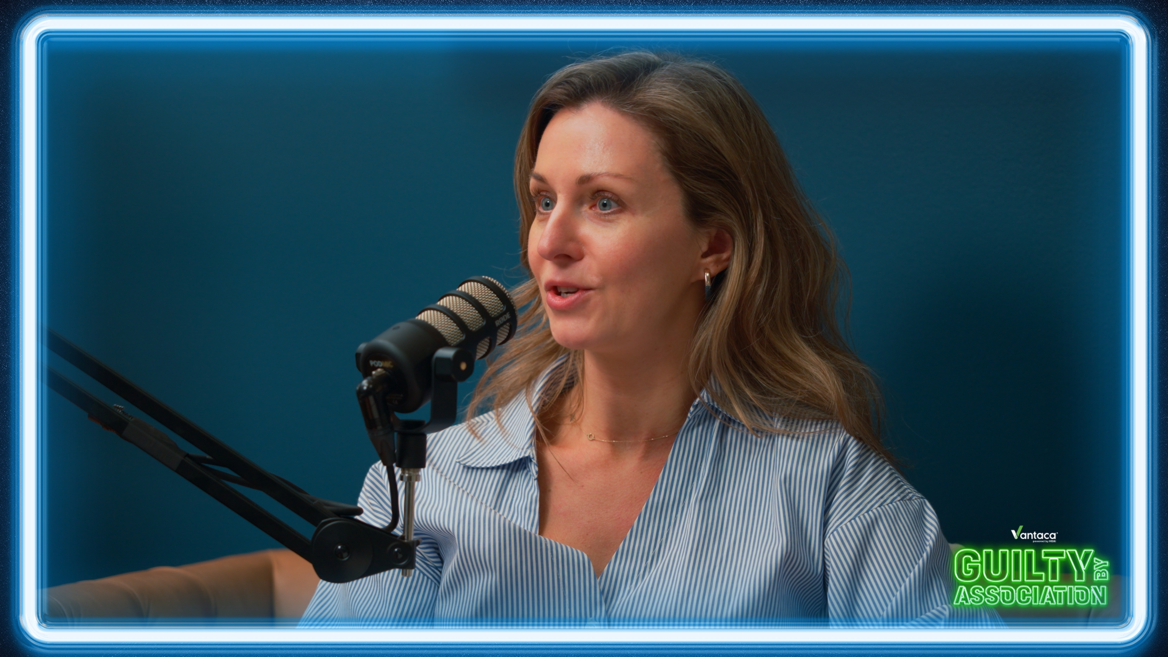 Marina Devalia speaking into a microphone during Vantaca's Guilty by Association podcast