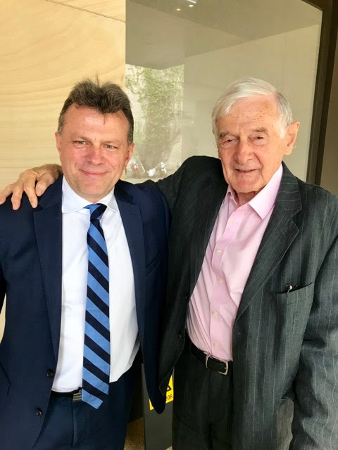 Mark Avery, left, standing beside his father Langer Avery