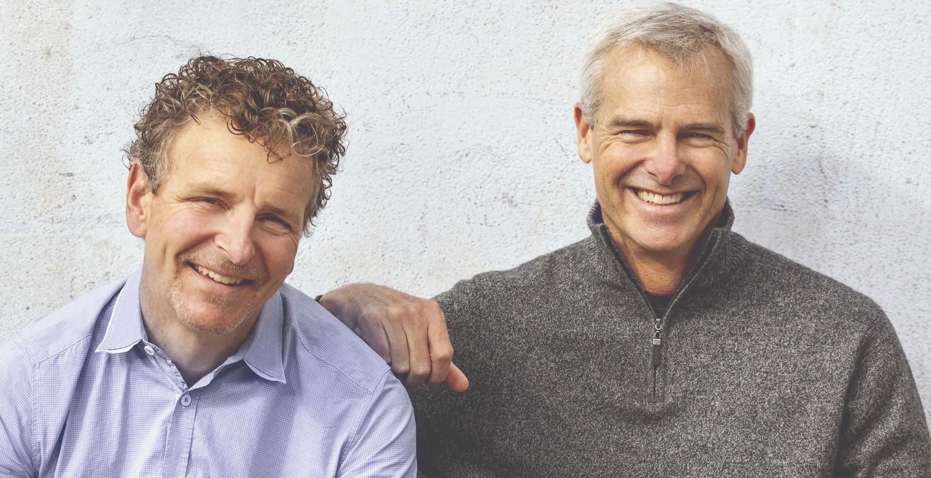 Michael Horvath, left, and Mark Gainey, right, smiling together