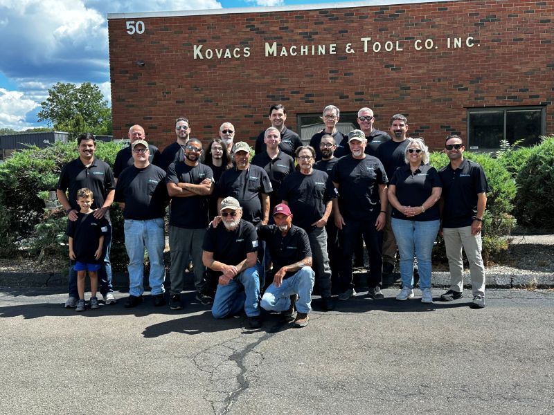 Former owners and team gathered outside the Kovacs Machine and Tool building for Simson Kovacs’s acquisition anniversary