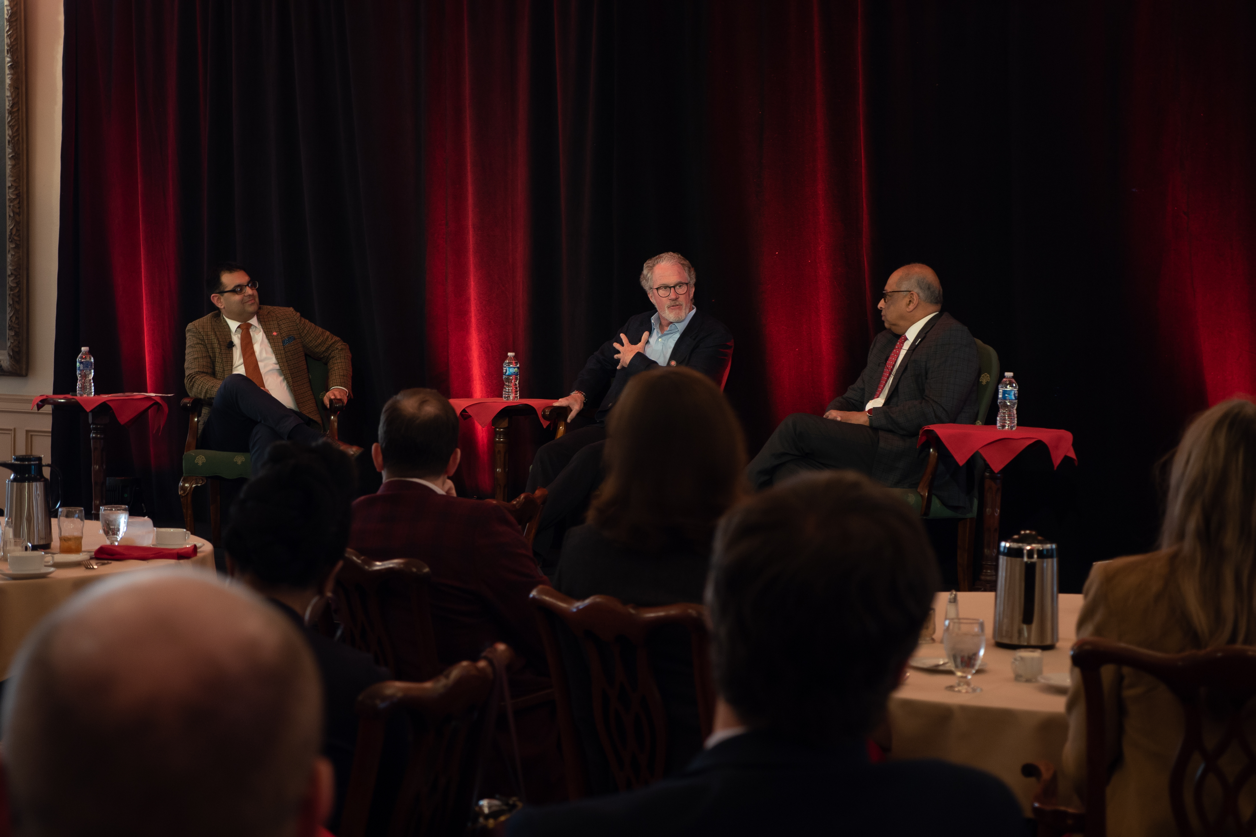 Mark Kvamme speaks between Jai Chabria and University of Cincinnati President Neville Pinto at the Queen City Club
