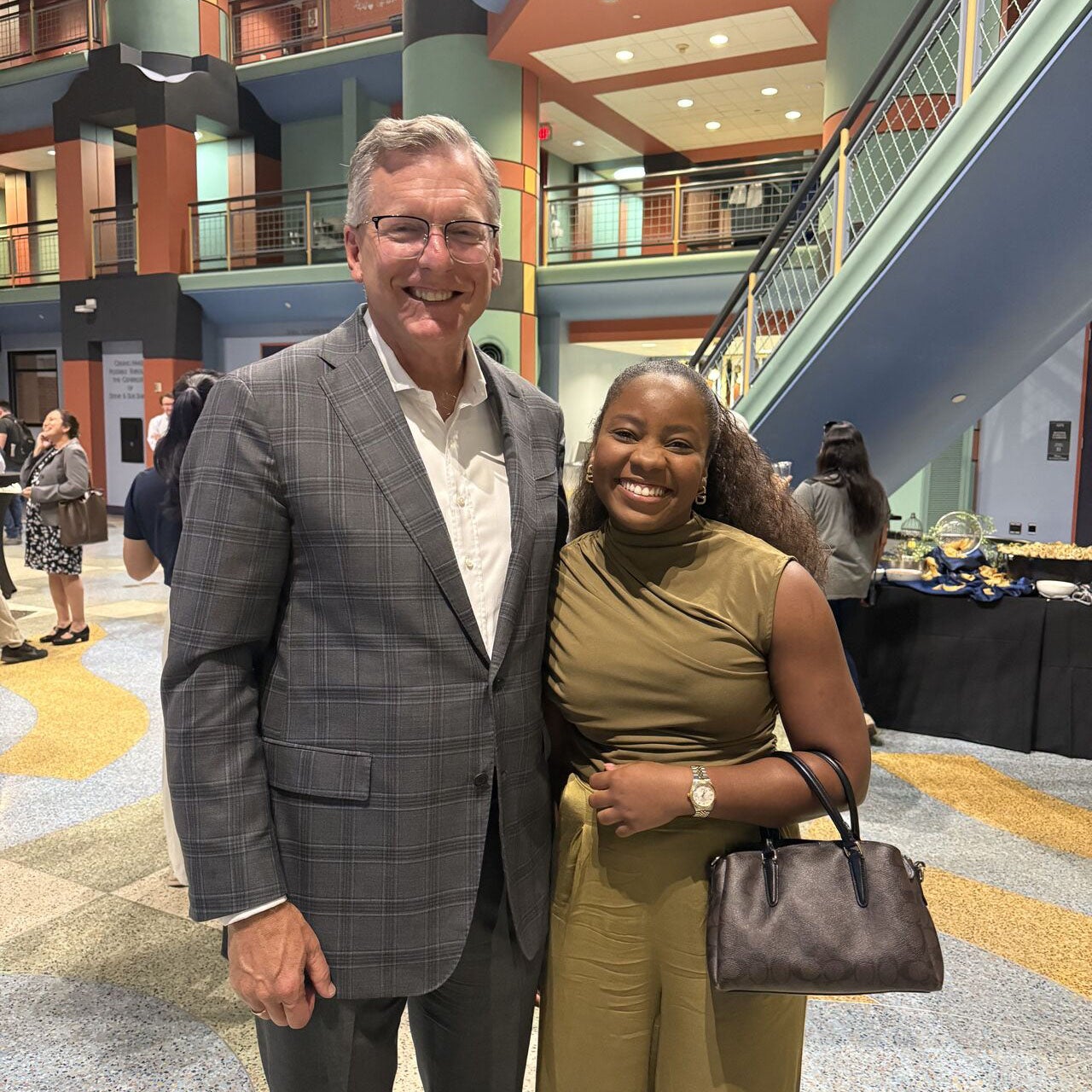 Mark Lashier standing with an attendee at Rice University’s Engineers in the C-Suite reception