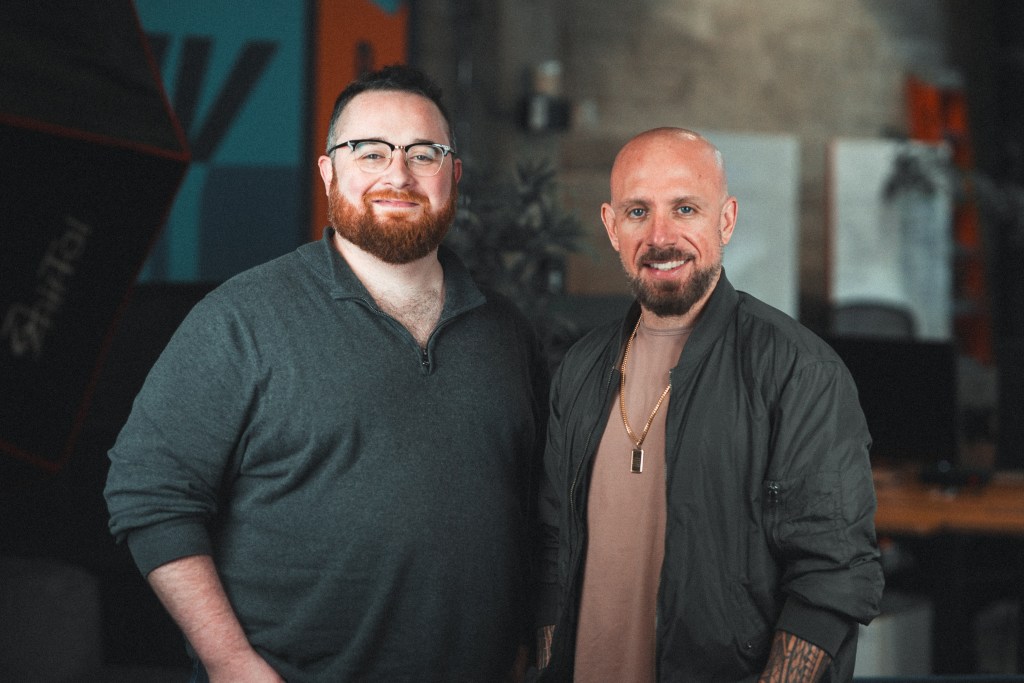 Arcee AI CTO Lucas Atkins and CEO Mark McQuade standing together