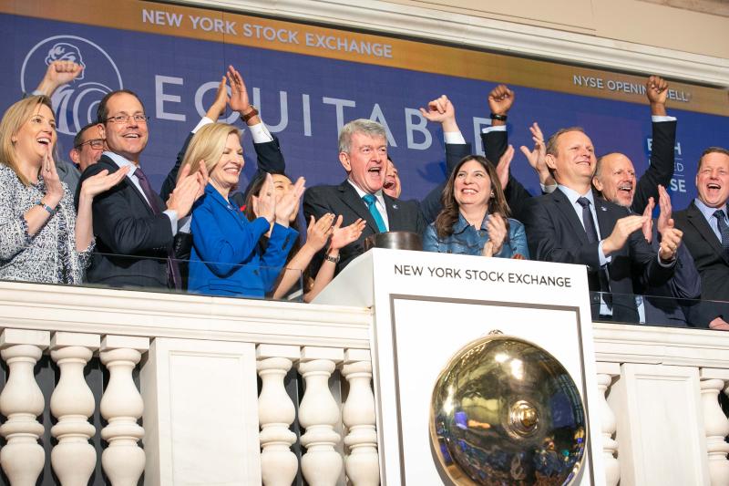 Mark Pearson and Equitable colleagues at the New York Stock Exchange opening bell in January 2020