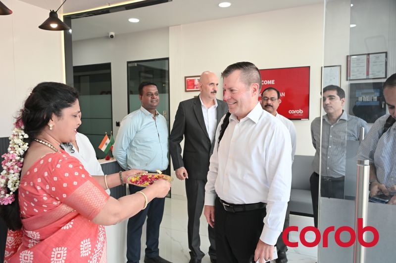 Mark Sheahan visiting the COROB India factory with members of its team