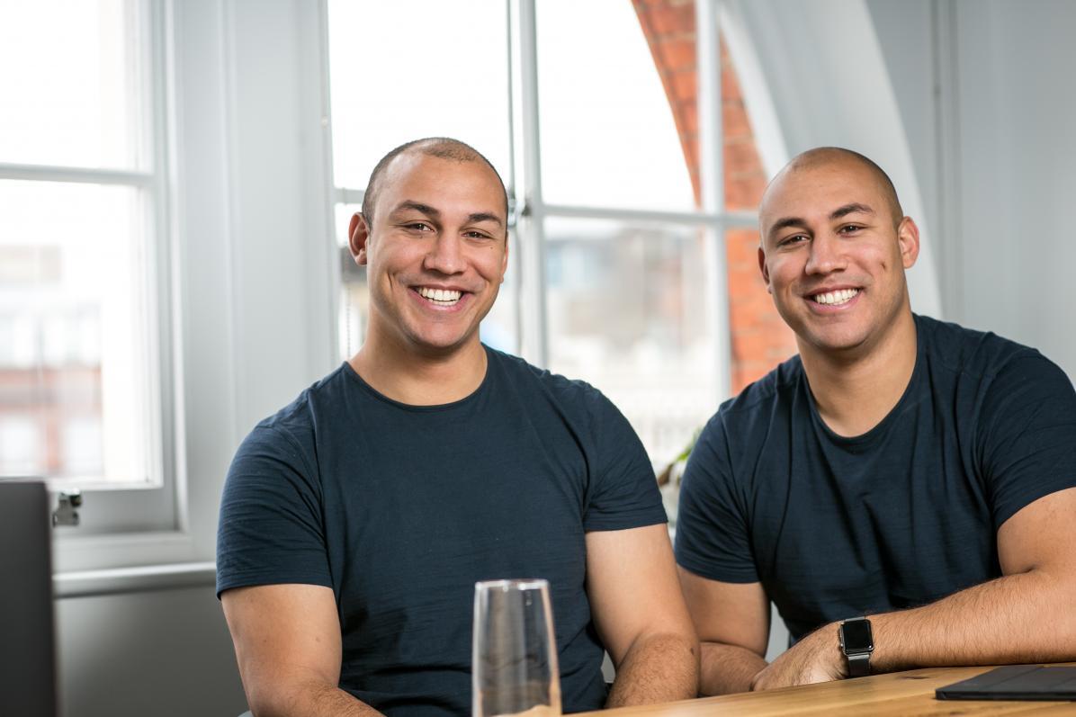 Marshmallow co-founders Alexander and Oliver Kent-Braham seated in their office