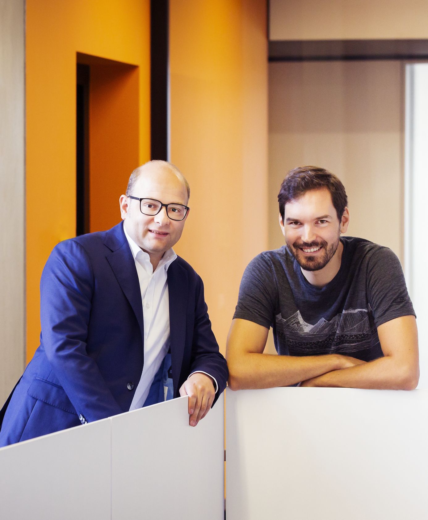 Celonis co-founders Bastian Nominacher and Martin Klenk standing together during a visit to the Technical University of Munich