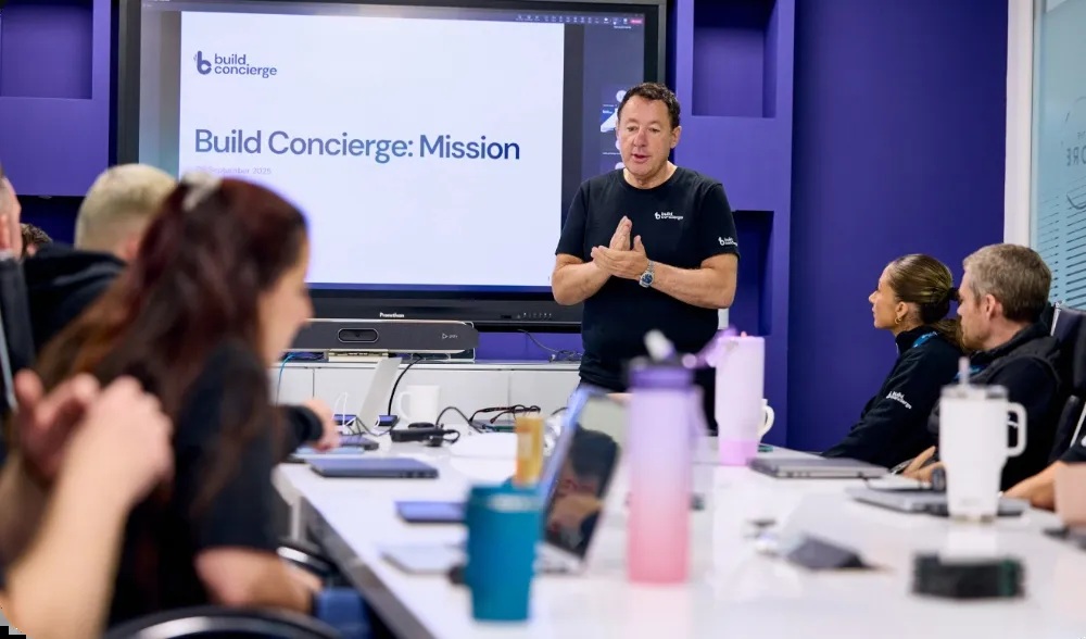 Martin Port leading a Build Concierge meeting around a table