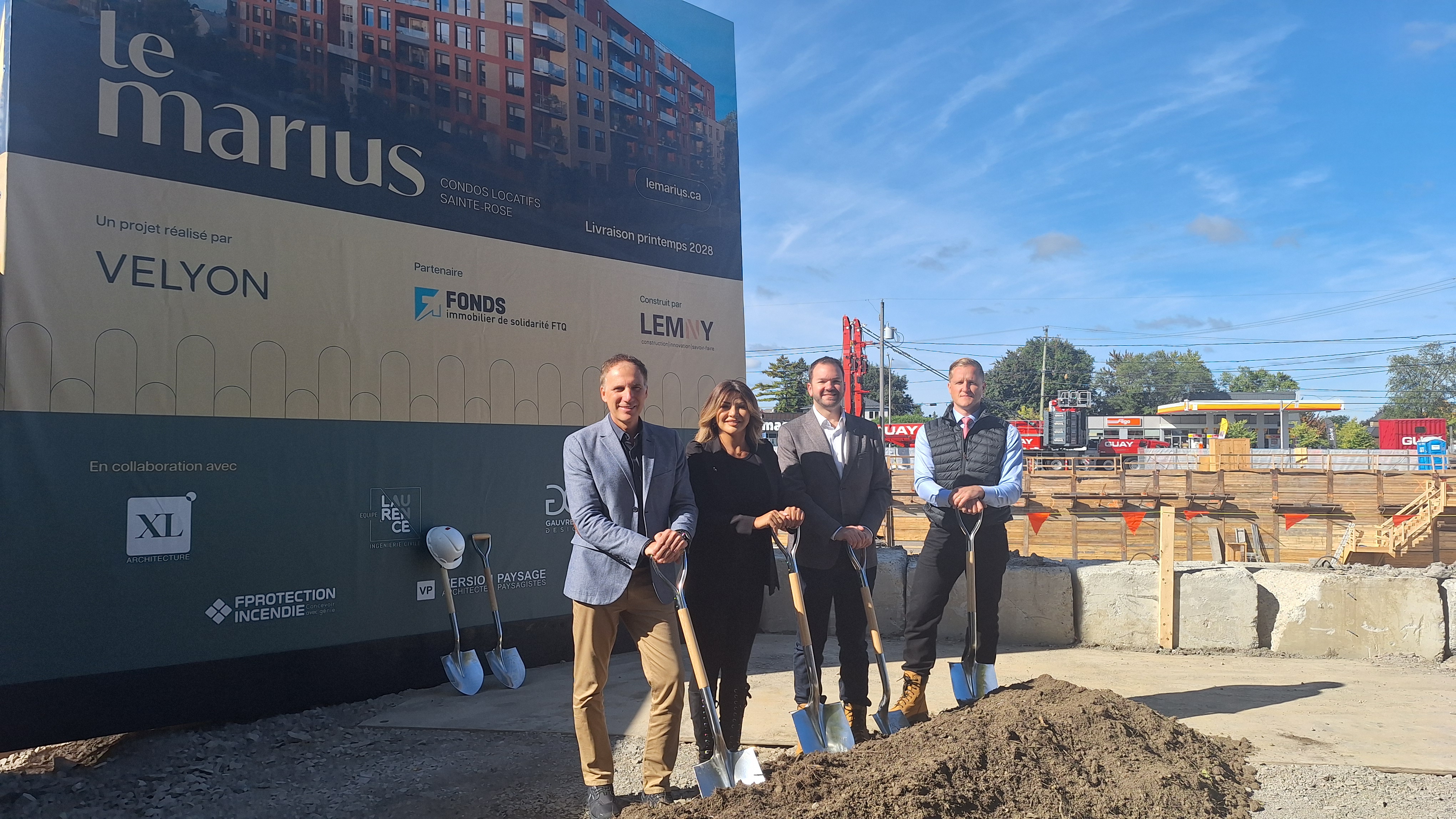 Martin Raymond, first from left, with Sandra El-Helou, Cédric Constantin and Michael Saint-Louis at the Le Marius construction site in Laval.