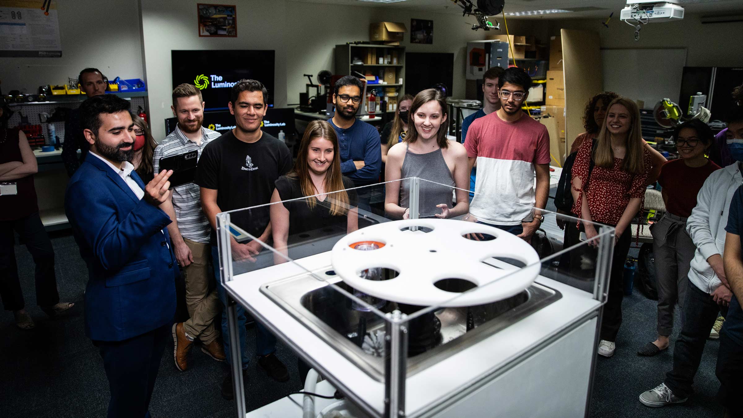 Mark Naufel and students discussing projects in Arizona State University's Luminosity Lab