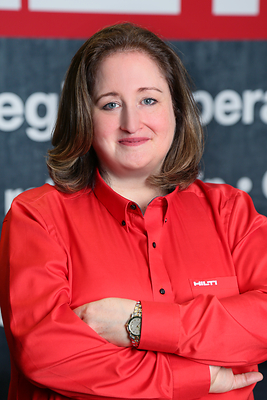 Martina McIsaac wearing a red Hilti shirt in a Hilti press photograph
