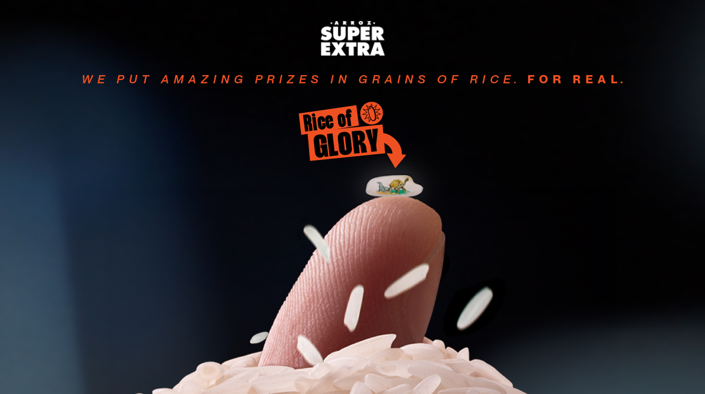 A prize-marked grain of rice balanced on a fingertip in the Super Extra Rice of Glory campaign