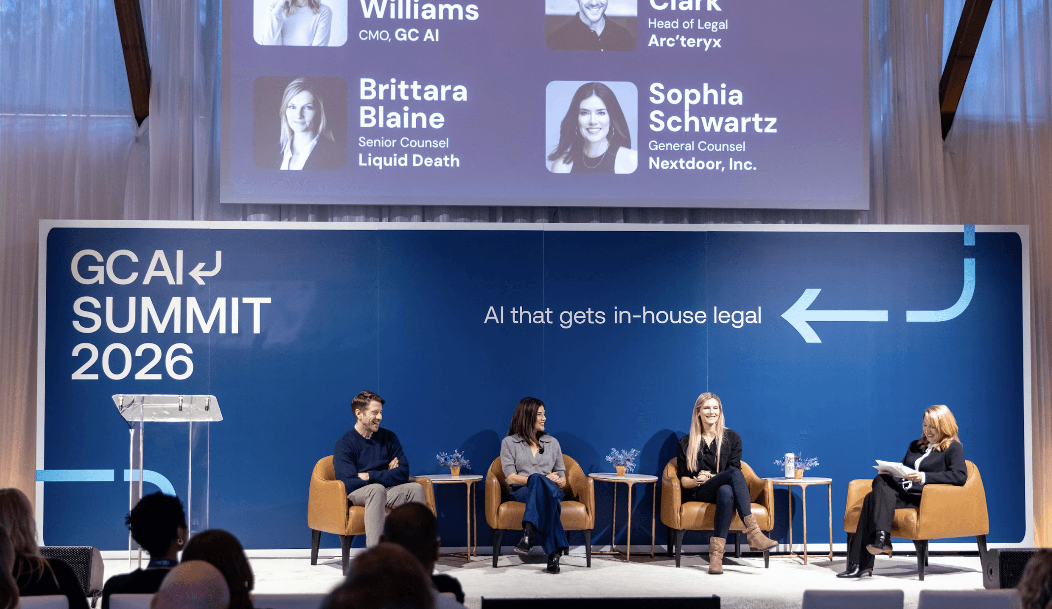 Mary Williams, seated at far right, moderates a panel at the GC AI Summit 2026