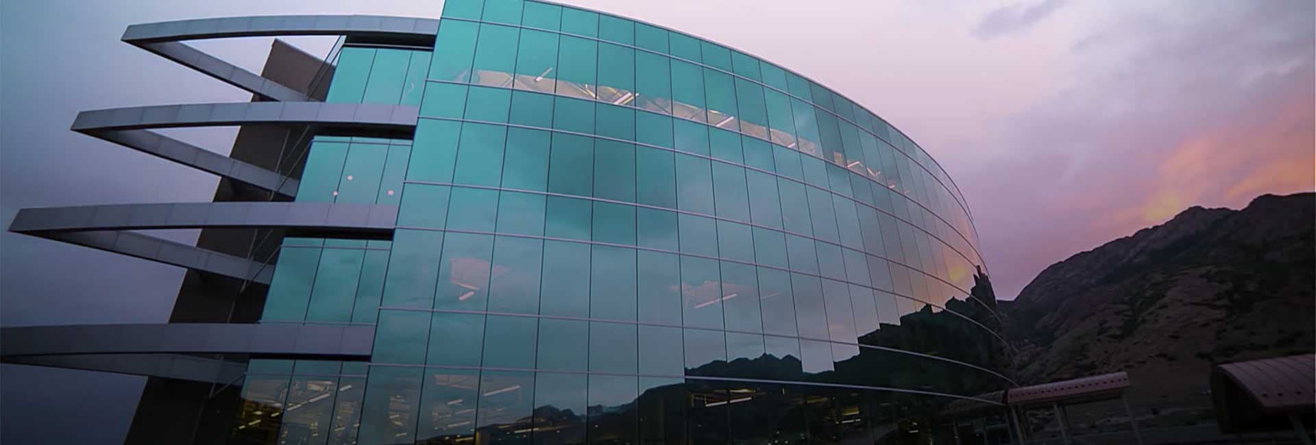 Exterior of MasterControl’s Utah office with mountains beyond