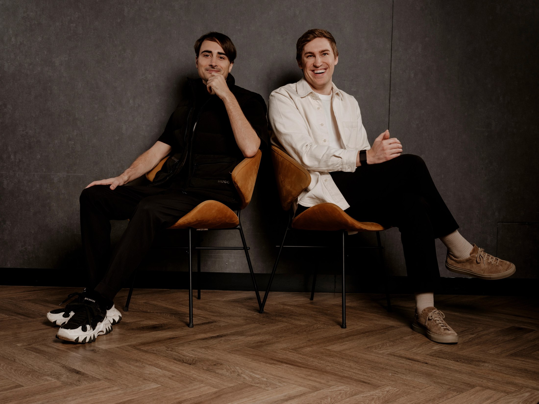 ElevenLabs cofounders Piotr Dąbkowski and Mati Staniszewski seated together