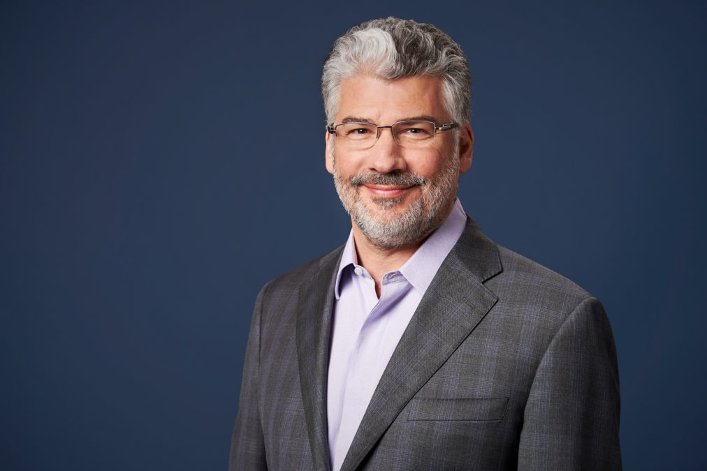 MATRIXX co-founder Dave Labuda, wearing glasses and a gray jacket