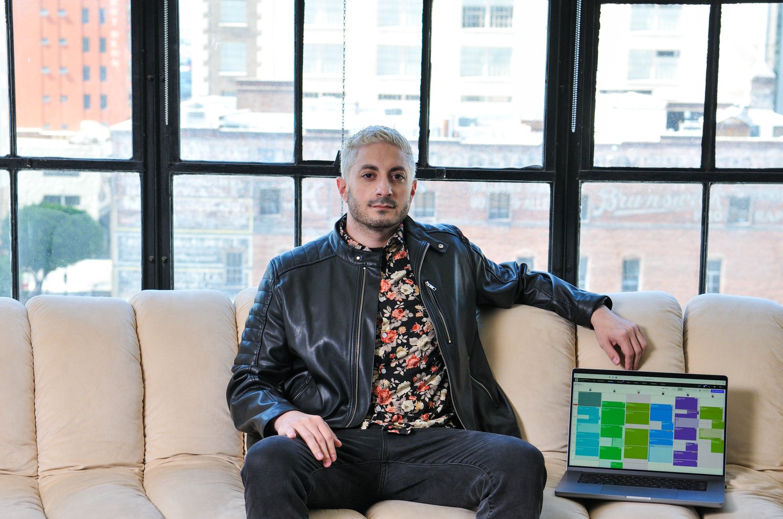 Matt Danna seated in Boulevard’s Los Angeles office beside a laptop displaying an appointment calendar