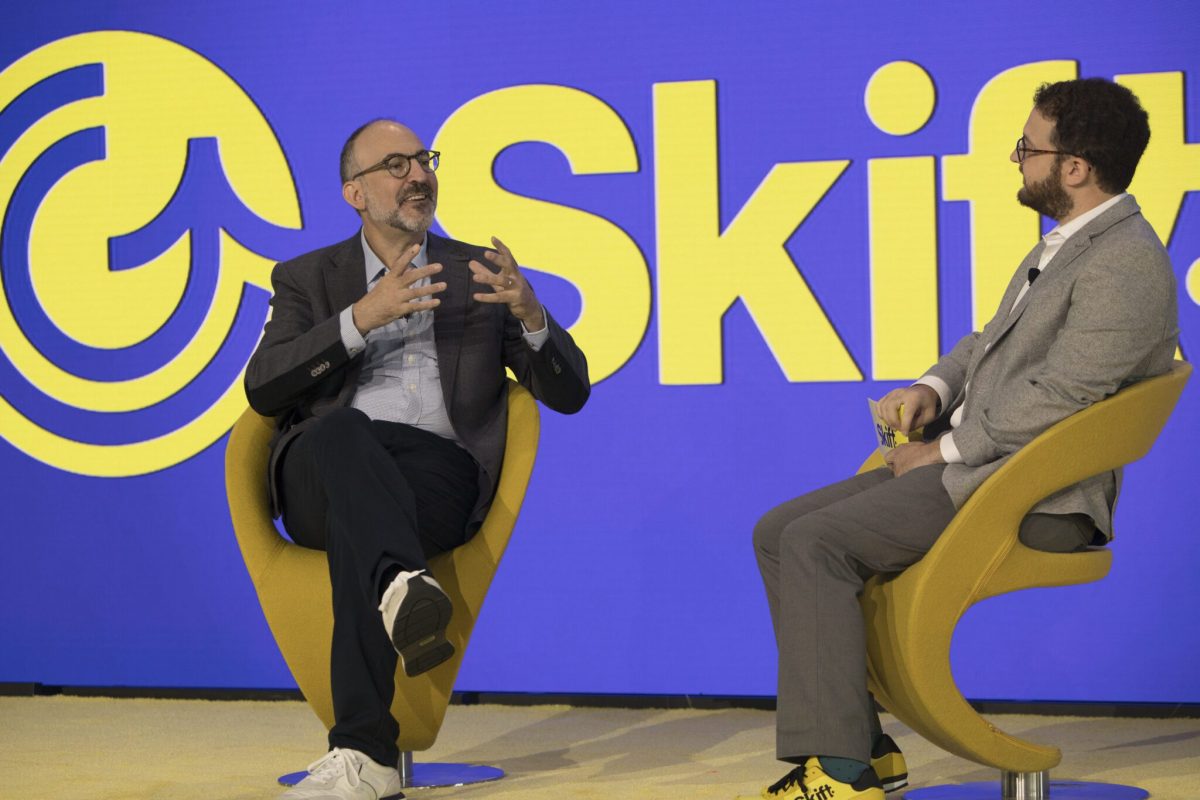 Matt Goldberg, left, speaking with Seth Borko onstage at Skift Global Forum in 2024