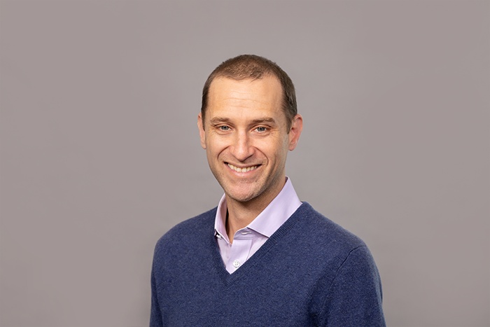 Matt Middleman in a blue sweater in a LifeSci press photograph