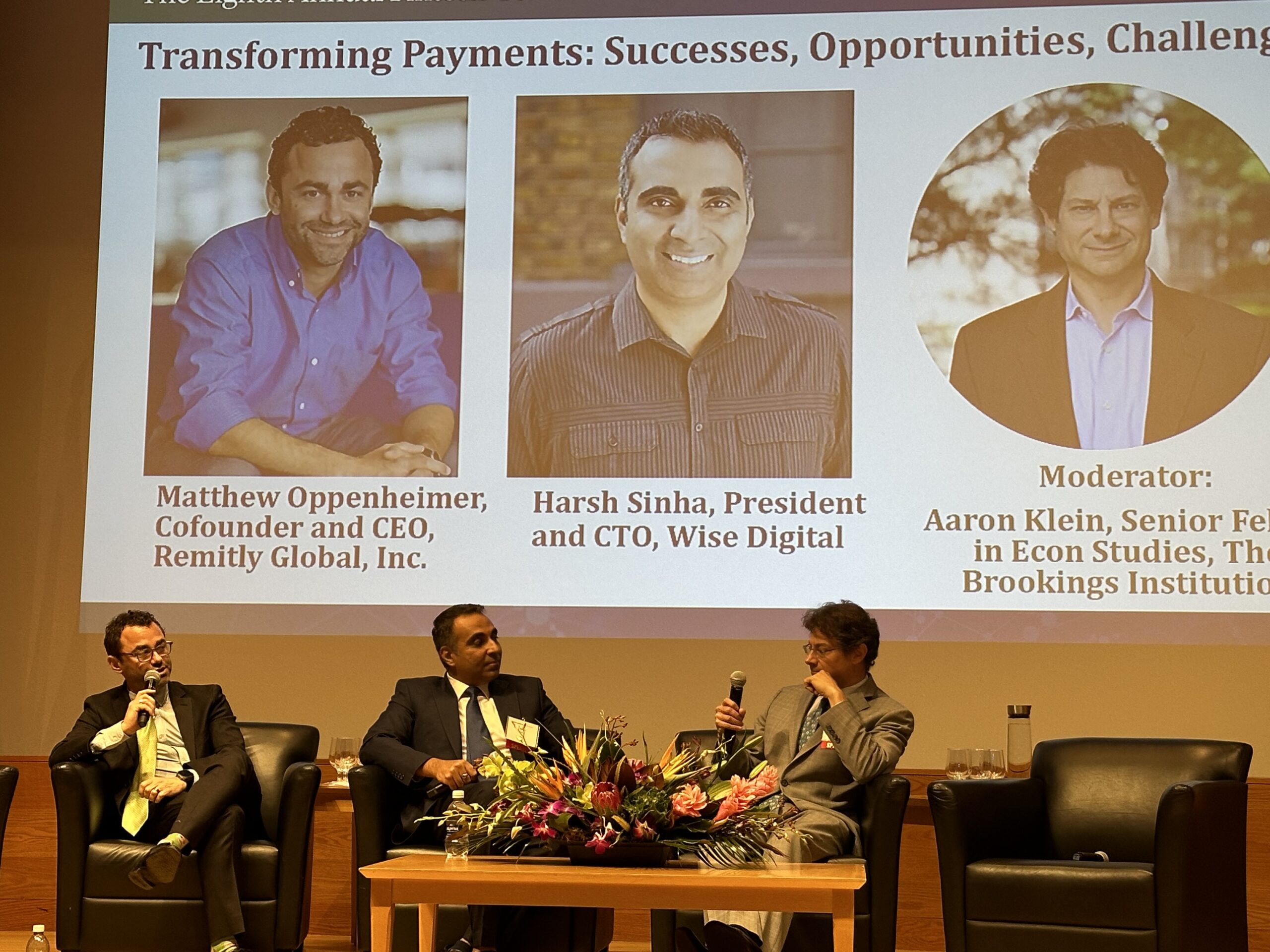 Matt Oppenheimer, left, speaking on a panel with Harsh Sinha and Aaron Klein in Philadelphia