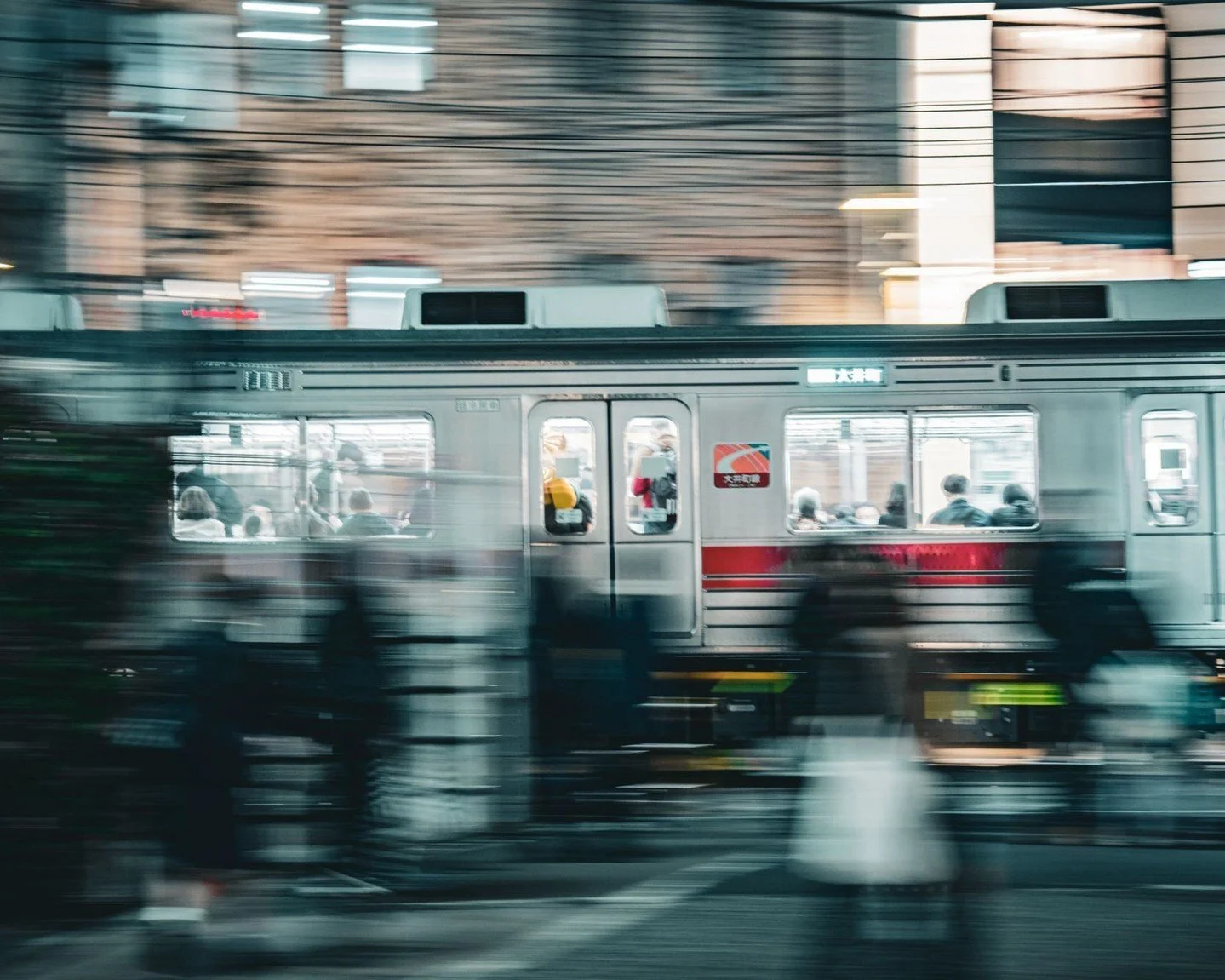 Night street photograph from Van Buskirk’s personal site, captioned as a slow-shutter experiment in Jiyugaoka, Tokyo