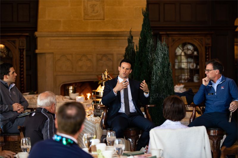 A seated discussion with Kevin Bozada and Paul Major at the Club at Longview, with attendees in the foreground