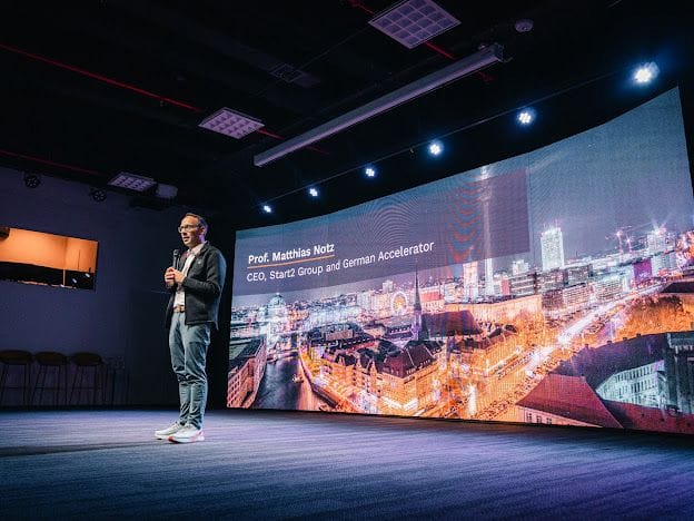 Matthias Notz speaking on stage at the South America launch and startup night in Buenos Aires