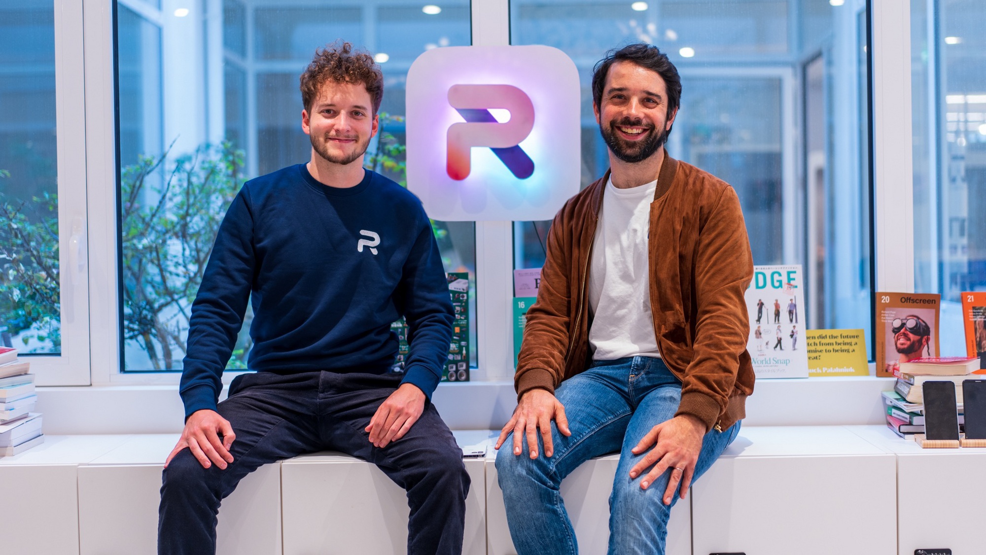Eliot Andres, left, and Matthieu Rouif, right, seated together at Photoroom