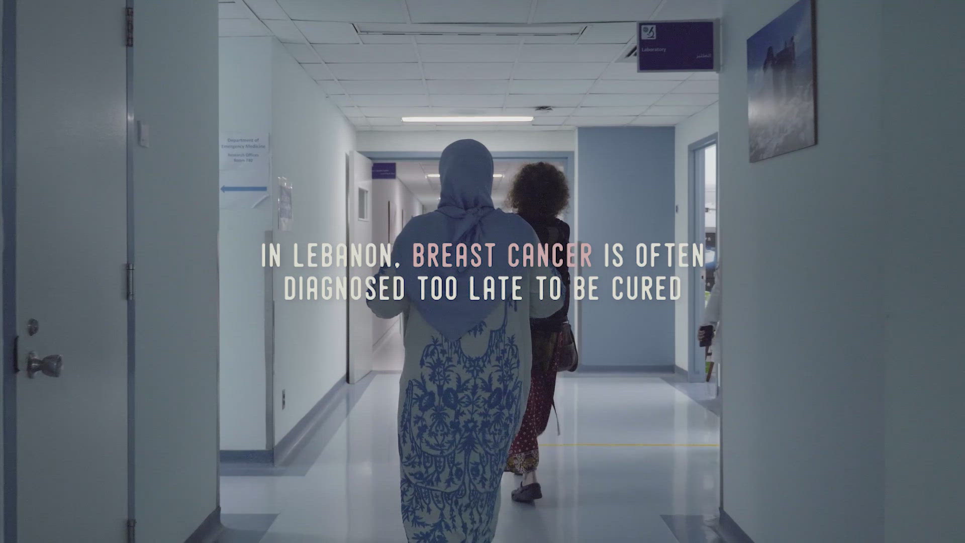 The Bread Exam campaign film shows two women walking through a hospital beneath a message about late breast cancer diagnosis in Lebanon