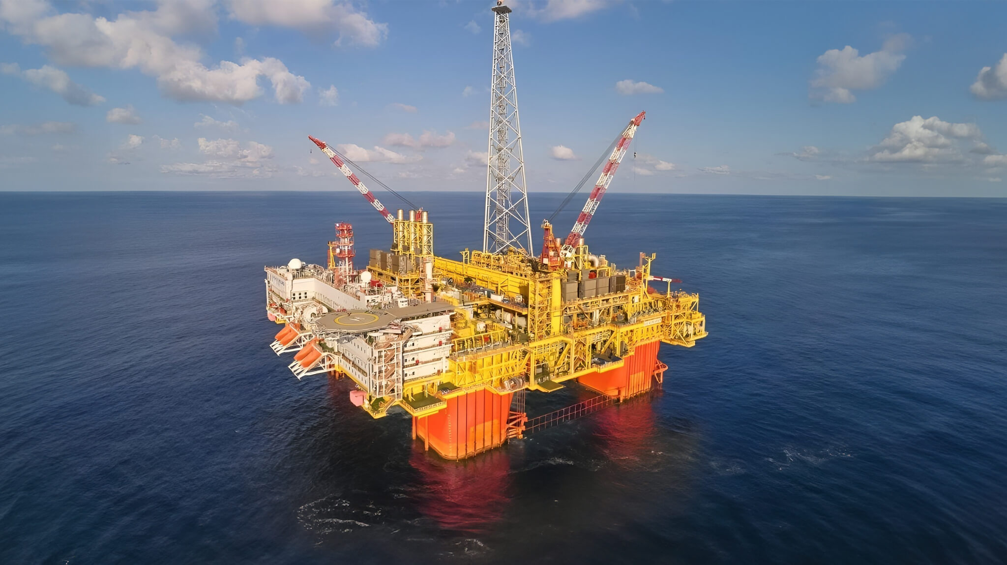Yellow offshore production facility at sea, pictured on McDermott’s Ichthys project page