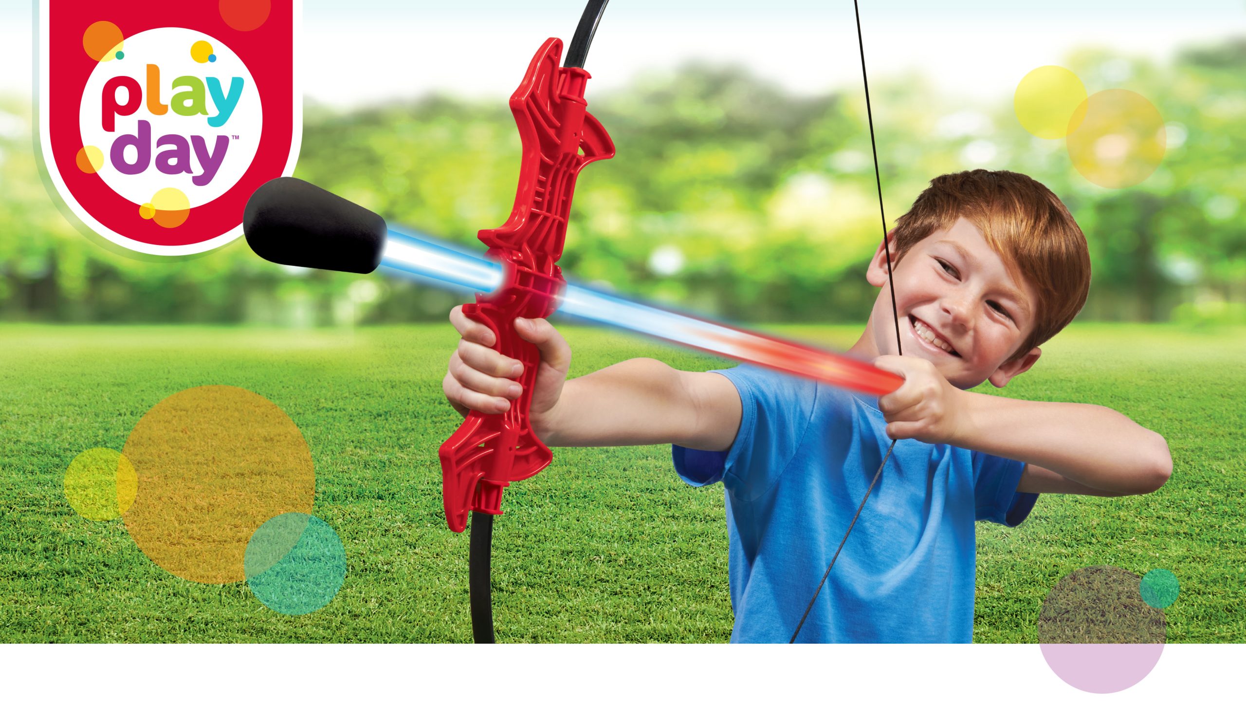 Play Day branding and lifestyle photograph of a child using a toy bow and arrow