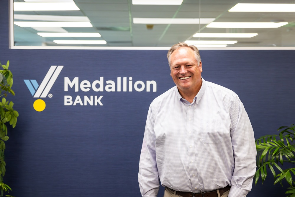 Medallion Bank lending executive Steve Hannay standing in the bank’s office