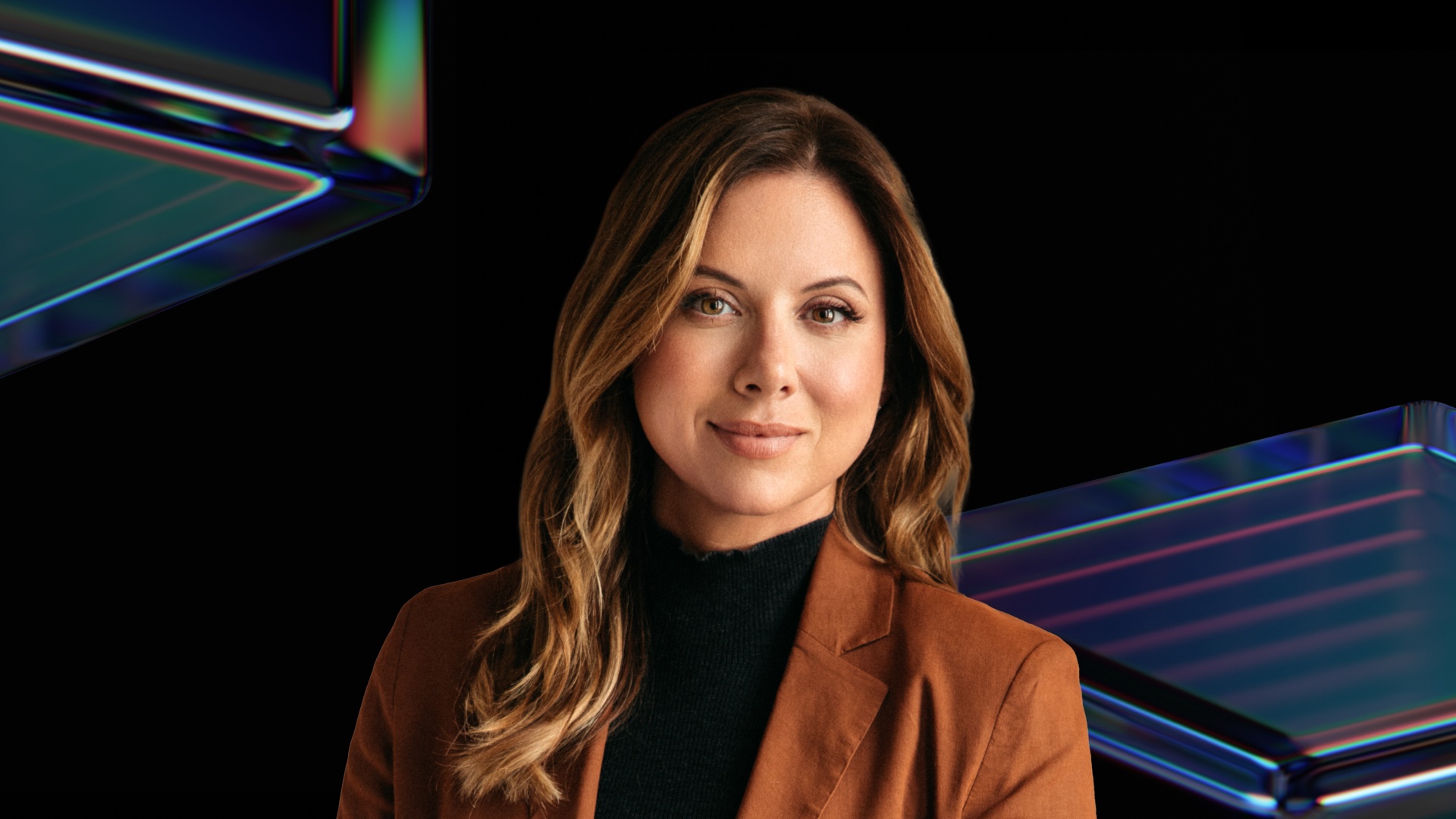 Megan Fales in a brown jacket, in the promotional image accompanying her UXDX communications session