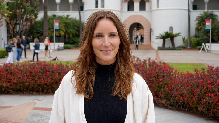Megan Imbres standing outside Hepner Hall at San Diego State University