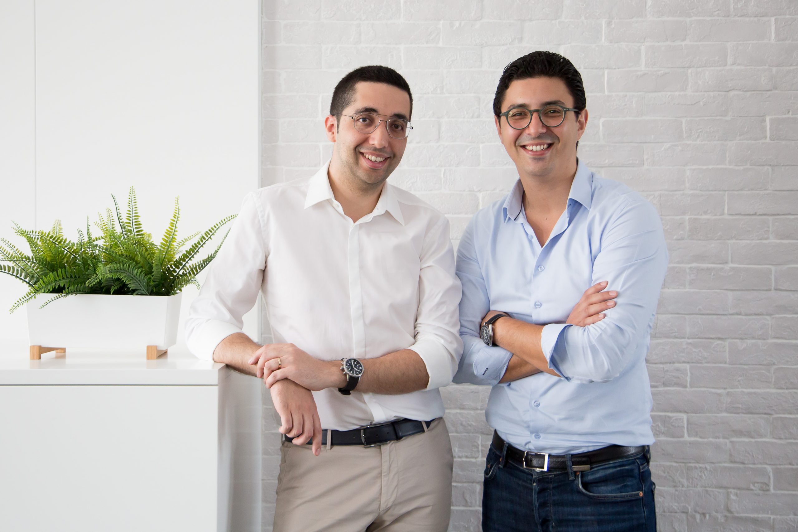 Mehdi Oudghiri, left, and Anass Boumediene, right, seated together