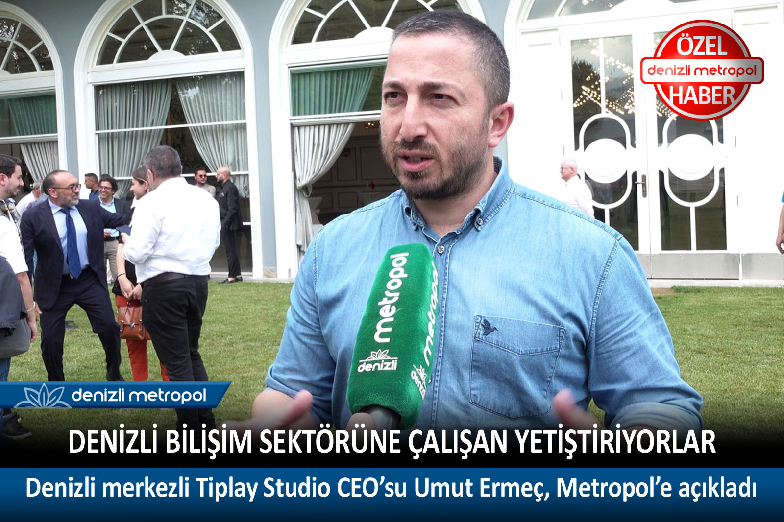 Mehmet Umut Ermeç speaking into a Denizli Metropol microphone during a 2022 interview