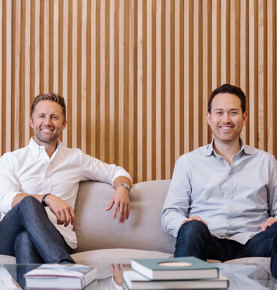 Melbourne O’Banion, left, and Jonathan Abelmann seated together in a Bestow office