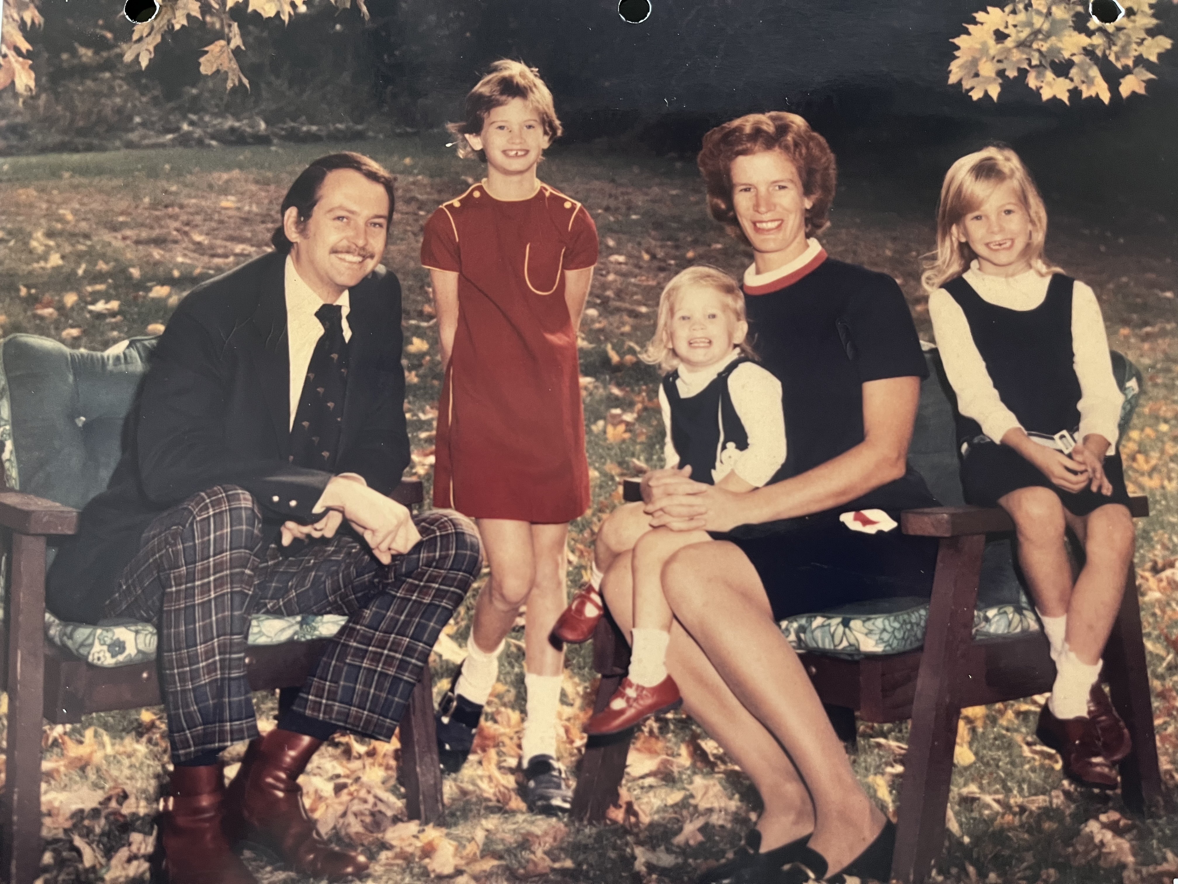 A childhood family photograph shared by Melissa Eamer, showing her parents and three daughters outdoors