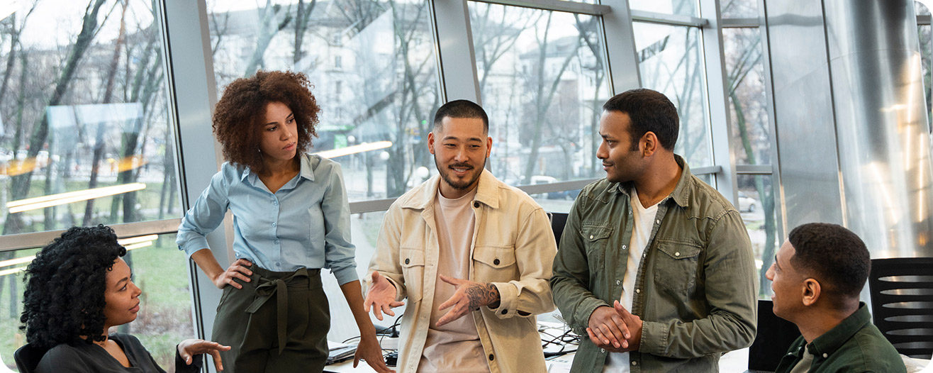 People gathered for a workplace conversation in an image published on Mercans’s culture page